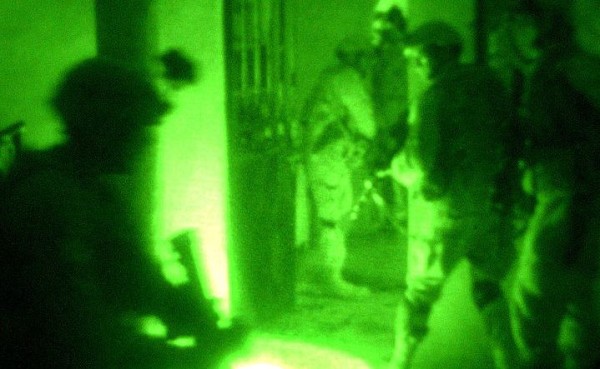Paratroopers conduct a raid on a suspected terrorist's home in Fallujah, Iraq
