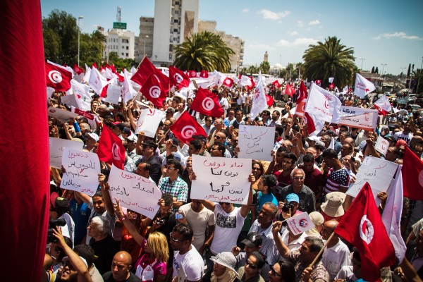 Different Slogans and banners talk about citizens, National Unity, anti terrorism and against the law of exclusion