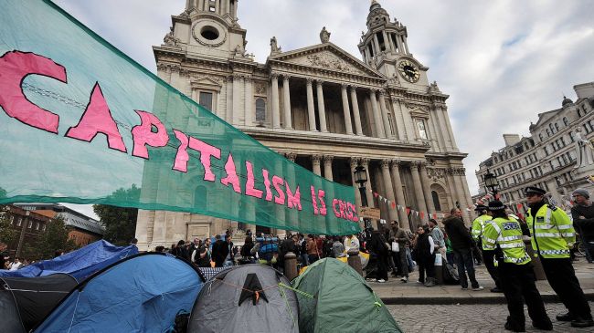 People protest outside St Paul's Cathedral in London during Occupy London demonstrations in November 2011.