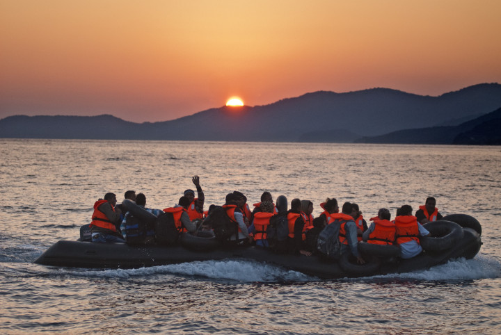 October 4,2015-Lesvos, North-east Aegean sea, Greece: Refugees arrive by a small plastic and cheap boat to the coasts of the Greek island Lesvos from the Turkish land (photo by Maro Kouri)