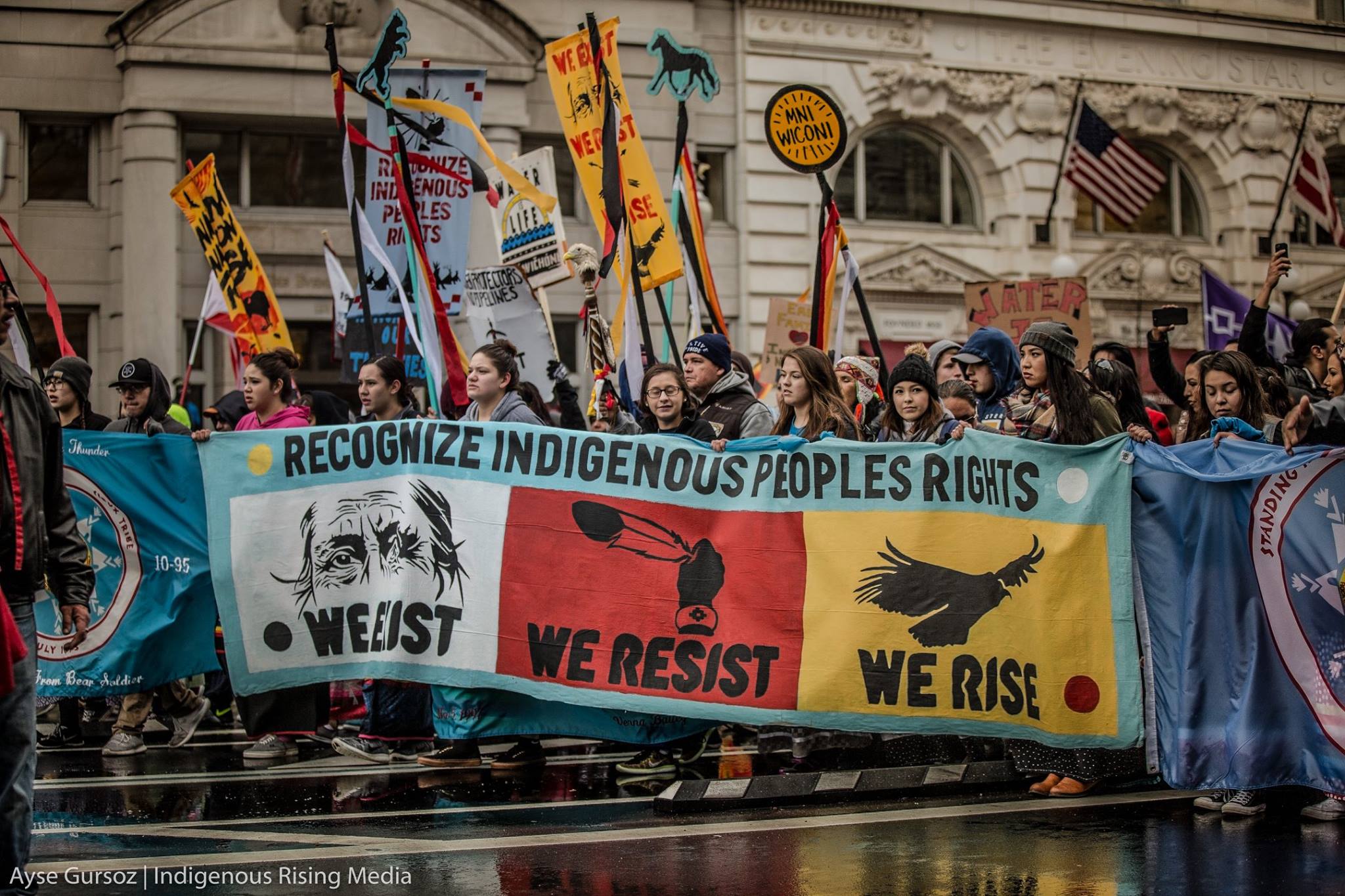 Activists and Native Americans march on Washington amid rain, sleet and ...