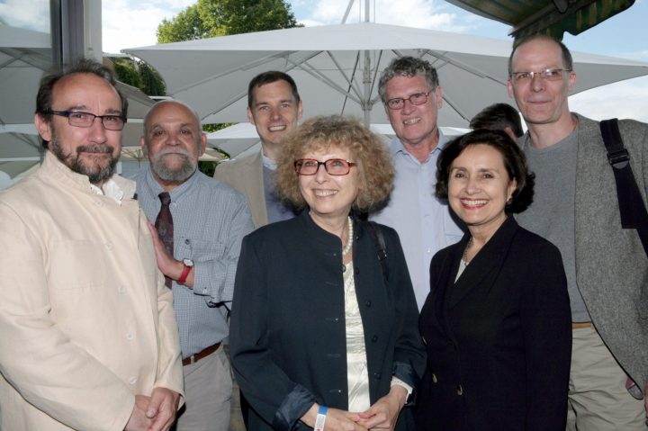 Pressenza's team at the Deutsche Welle Global Media Forum, 2014, (l to r, David Andersson, Baher Kamal, Tony Robinson, Silvia Swinden, Tony Henderson, Pía Figueroa, Reto Thumiger)