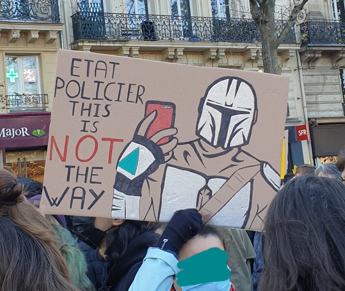 Thousands of protesters march in France against security law that bans