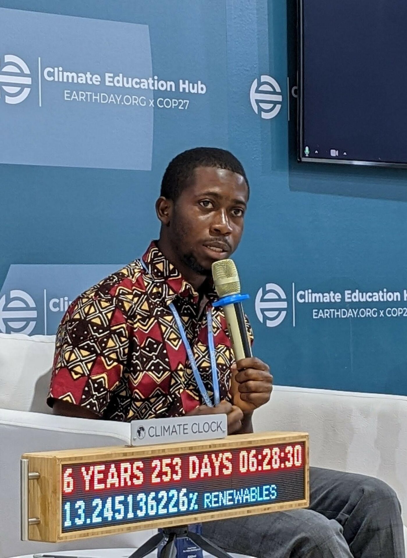 Ezekiel Nyanfor speaking at a climate education side event during COP27 on November 12, 2022.