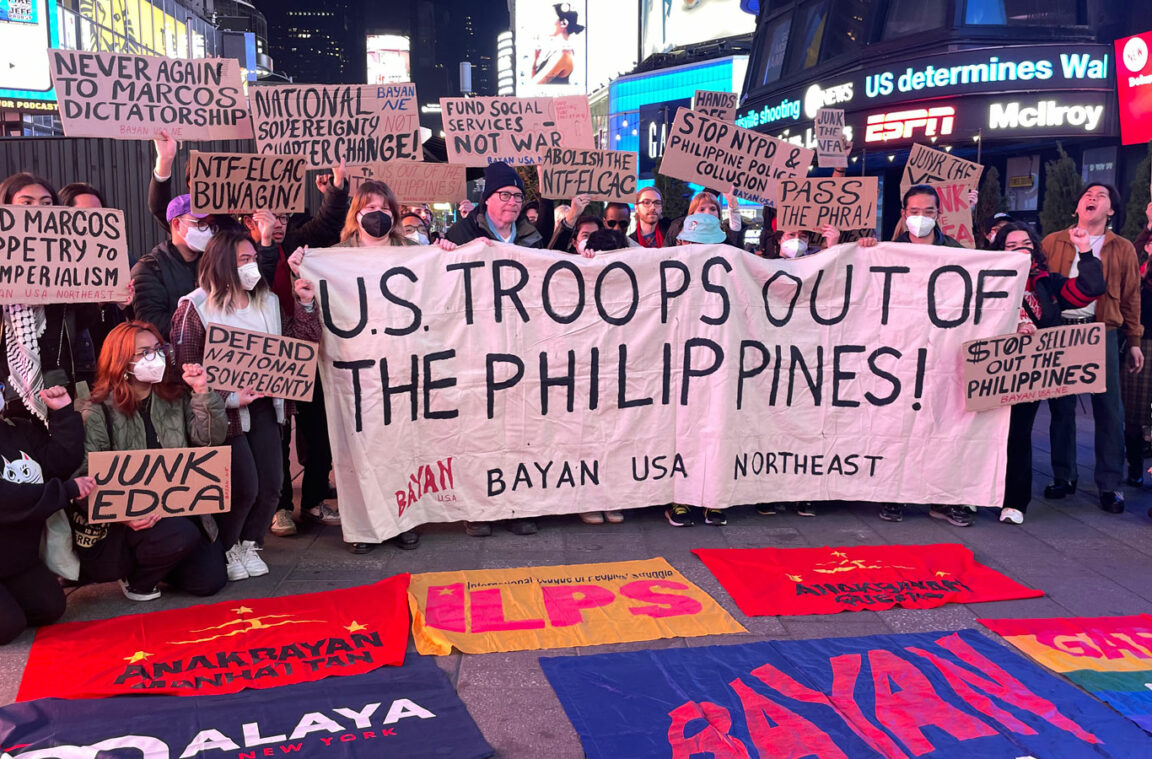 A coalition of Filipino activists denounce joint U.S.-Filipino military exercises in a Times Square protest.