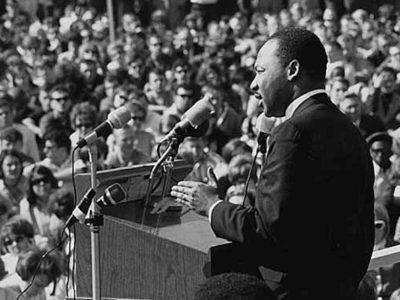 Dr Martin Luther King speaking against war in Vietnam, St. Paul Campus, University of Minnesota by Minnesota Historical Society.