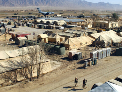 The military camp at Bagram, Afghanistan is home to U.S. Airmen, Soldiers, Marines and Sailors supporting Operation Enduring Freedom. Service members from countries like Germany, England, Korea, Australia and Canada also call the camp home. (U.S. Air Force photo by SSgt. Derrick C. Goode)(RELEASED)