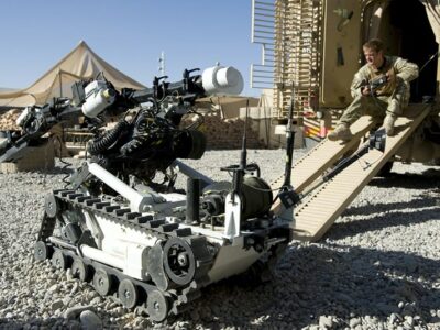 A soldier operates the remote controlled Mark 8 Wheel Barrow Counter IED Robot