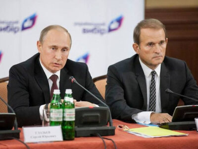 Russian President Vladimir Putin and Viktor Medvedchuk at a 2013 conference entitled “Orthodox-Slavic Values — The Basis of Ukraine's Civilizational Choice”