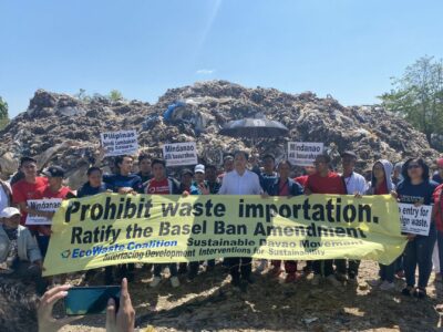 Port Collector John Simon joins activists in pushing for strong policies to end foreign waste dumping.