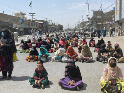 Woman activists of Baloch Yakjehti Committee stage protest against alleged human rights violations and heavy deployment of security forces in Balochistan blocking a key traffic road in Quetta on July 28, 2024.