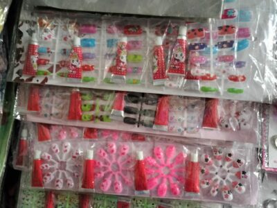 Unauthorized plastic nail sets with DBP-containing adhesive sold at Divisoria Mall, Binondo, Manila.