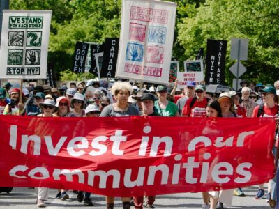 Vanguard S.O.S. marching to the entrance of Vanguard’s campus in suburban Philadelphia on July 3.