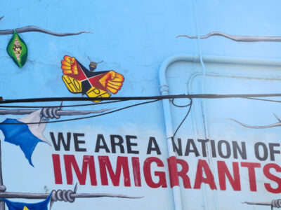 'We are a nation of immigrants' mural in Chicago from 'Declaration of Immigration' mural by Yollocalli Arts Reach, located at 1413 W 18th Street in Pilsen, Chicago, Illinois. Photographed in September 2014. Author:	Acediscovery. Wikimedia Commons.