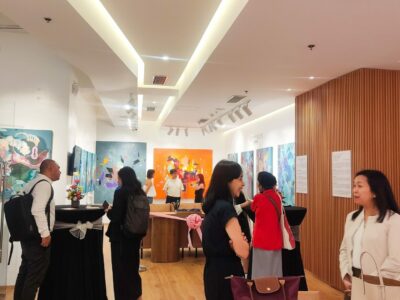 Guests and interested viewers during the opening night of the exhibit.