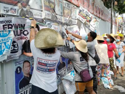 POST-ELECTION CLEAN-UP: Members of the EcoWaste Coalition conducted a clean-up drive around Flora Ylagan High School in Quezon City a day after the national and local elections to call on candidates to take responsibility for campaign waste and comply with COMELEC’s clean-up directive.