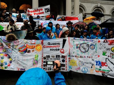 Press Conference at NYC City Hall. The Queens Community House designed a Quilt to offer to the Base Team of the 1st World March for Peace abd Nonviolence