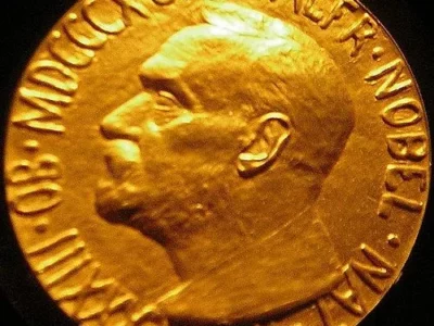 Nobel Peace Prize. Photograph: en:User:Anubis3Medal: Gustav Vigeland, Public domain, via Wikimedia Commons