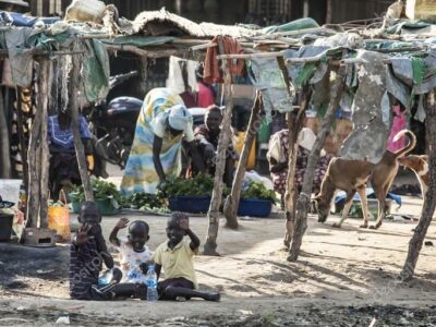 Unidentified children and families live a tenuous life of poverty in Bor, South Sudan.
