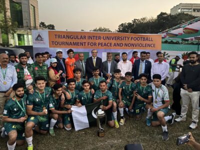 The Pakistan Punjab University team is celebrating their victory with the tournament's champion
trophy. Standing in the background are the two esteemed guests—Pakistan High Commissioner to
Dhaka, Imran Haider, and Vice-Chancellor of Bangladesh Agricultural University, Professor Dr. Abdul Latif.