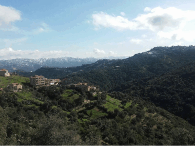 Tighzert Aït Aïssi, nestled in the heart of the Kabyle villages and watched over by the majestic Djurdjura Mountains. (Image: M.A)